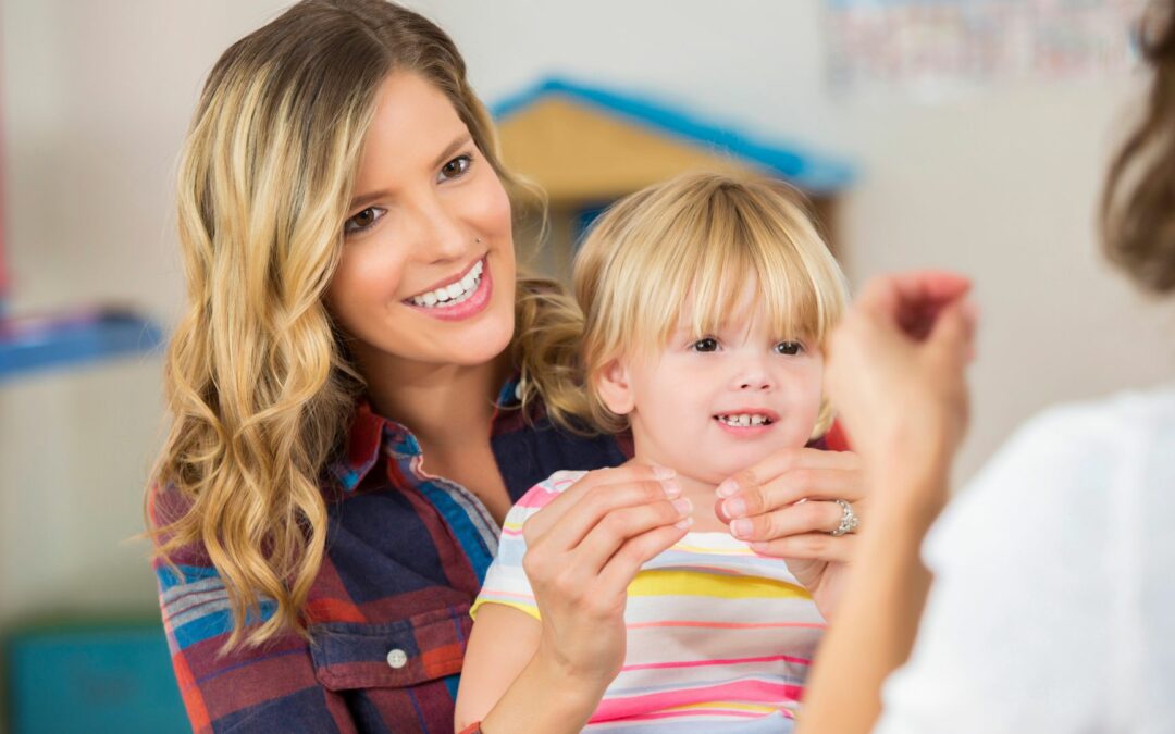Parent and child doing sign language