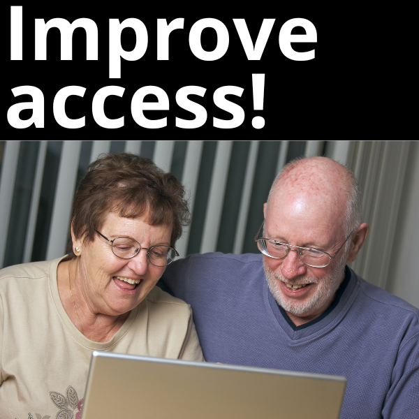 A man and a woman working on a laptop