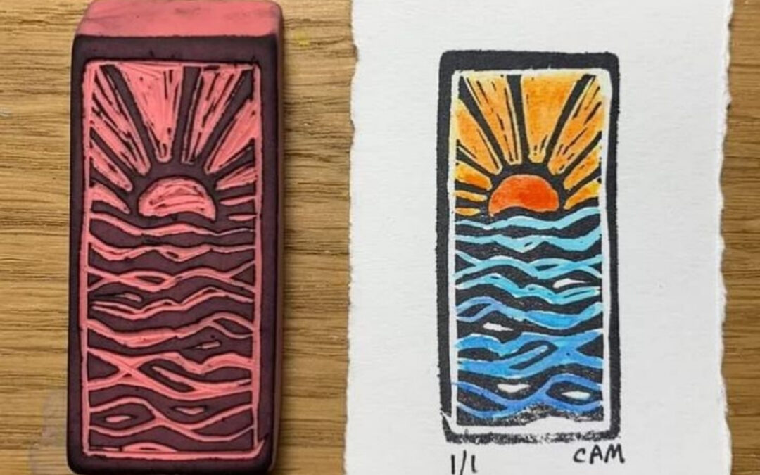 Pink eraser with sunset drawn onto it