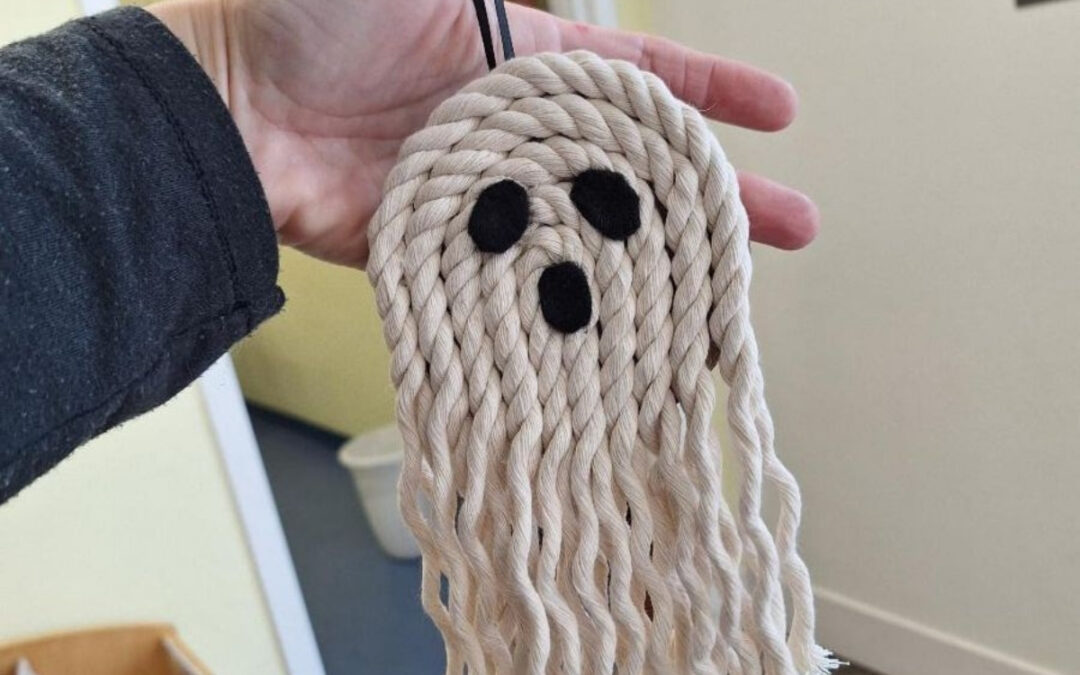 A ghost decoration made of white rope.