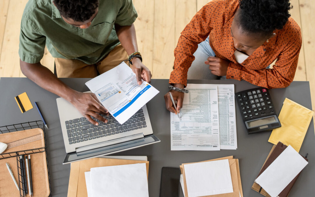 Overview of two young economists discussing finances