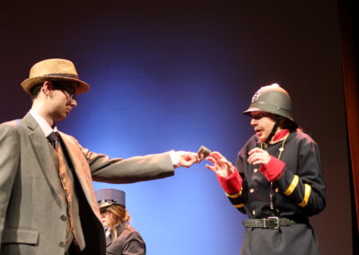 A man handing an official money