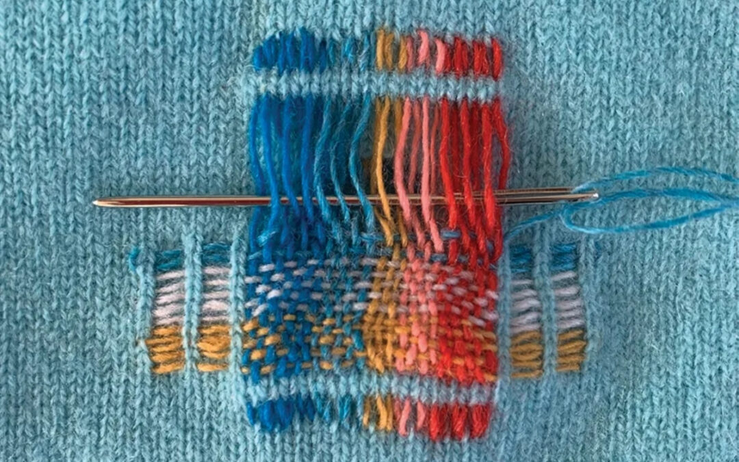 Mending needle in a knitted project